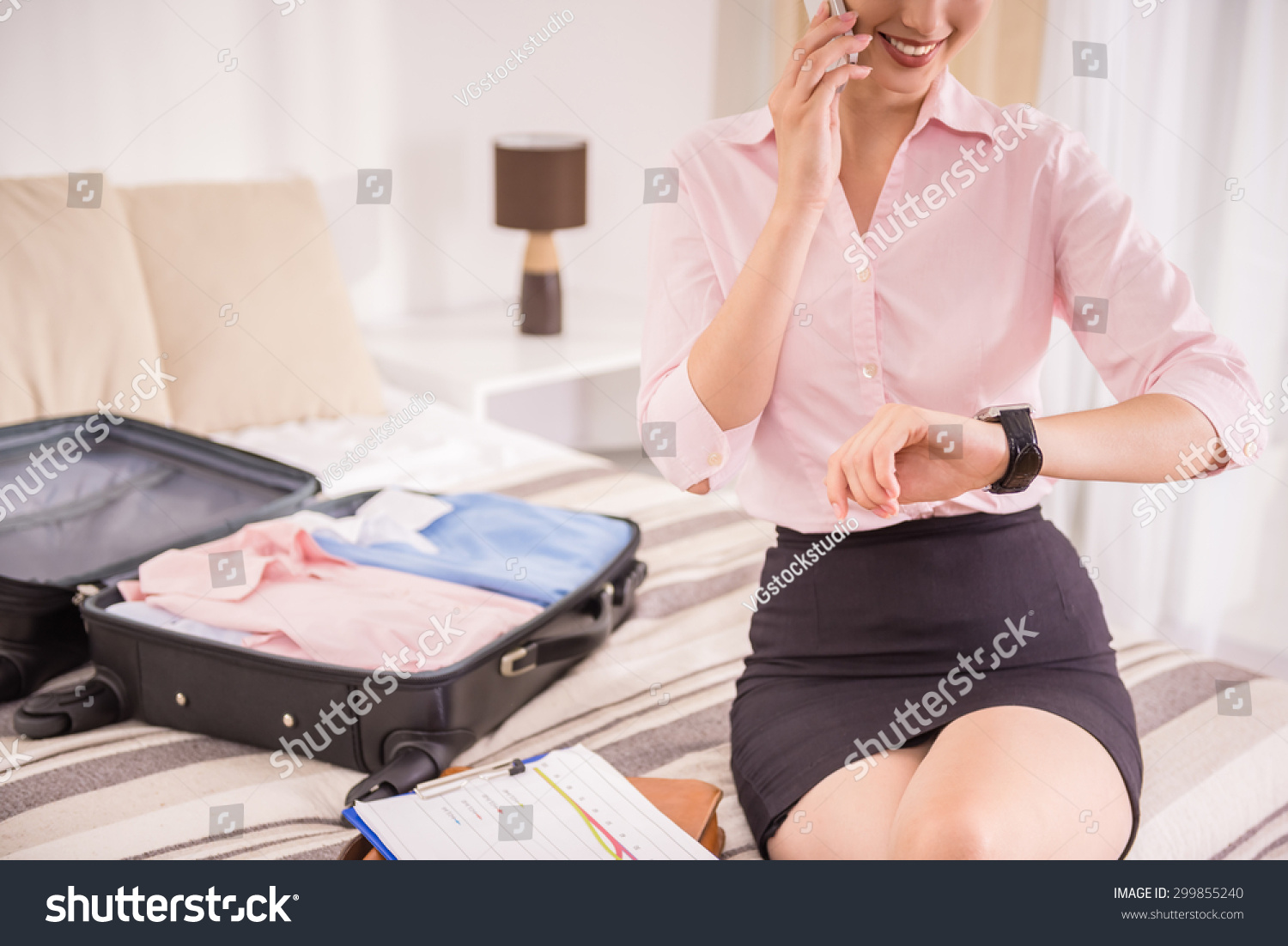 stock-photo-young-business-lady-hurring-up-to-meeting-and-talking-by-phone-close-up-299855240